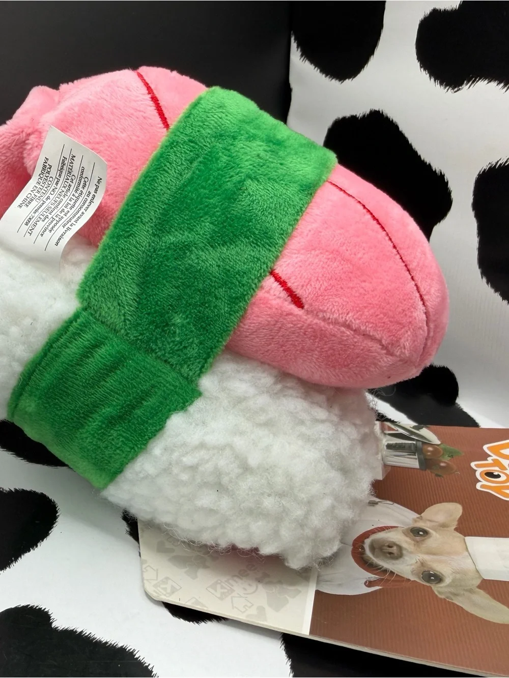 Kimee Pink Squeaky Plush Sushi Dog Toy with Green Band to Mimi’s seaweed